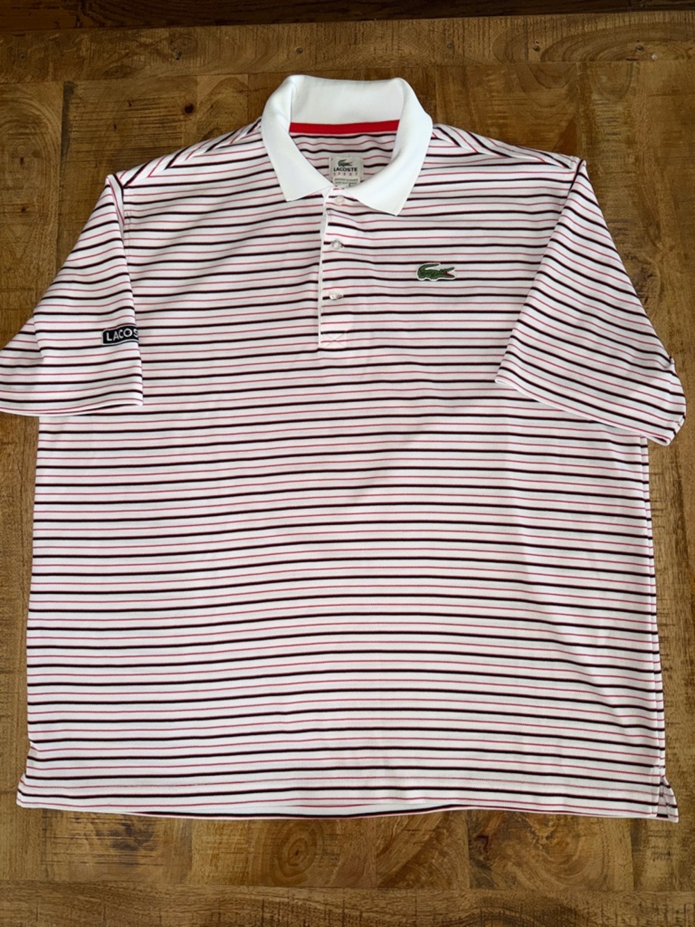 Lacoste Men’s White Polo with red and Black Stripes